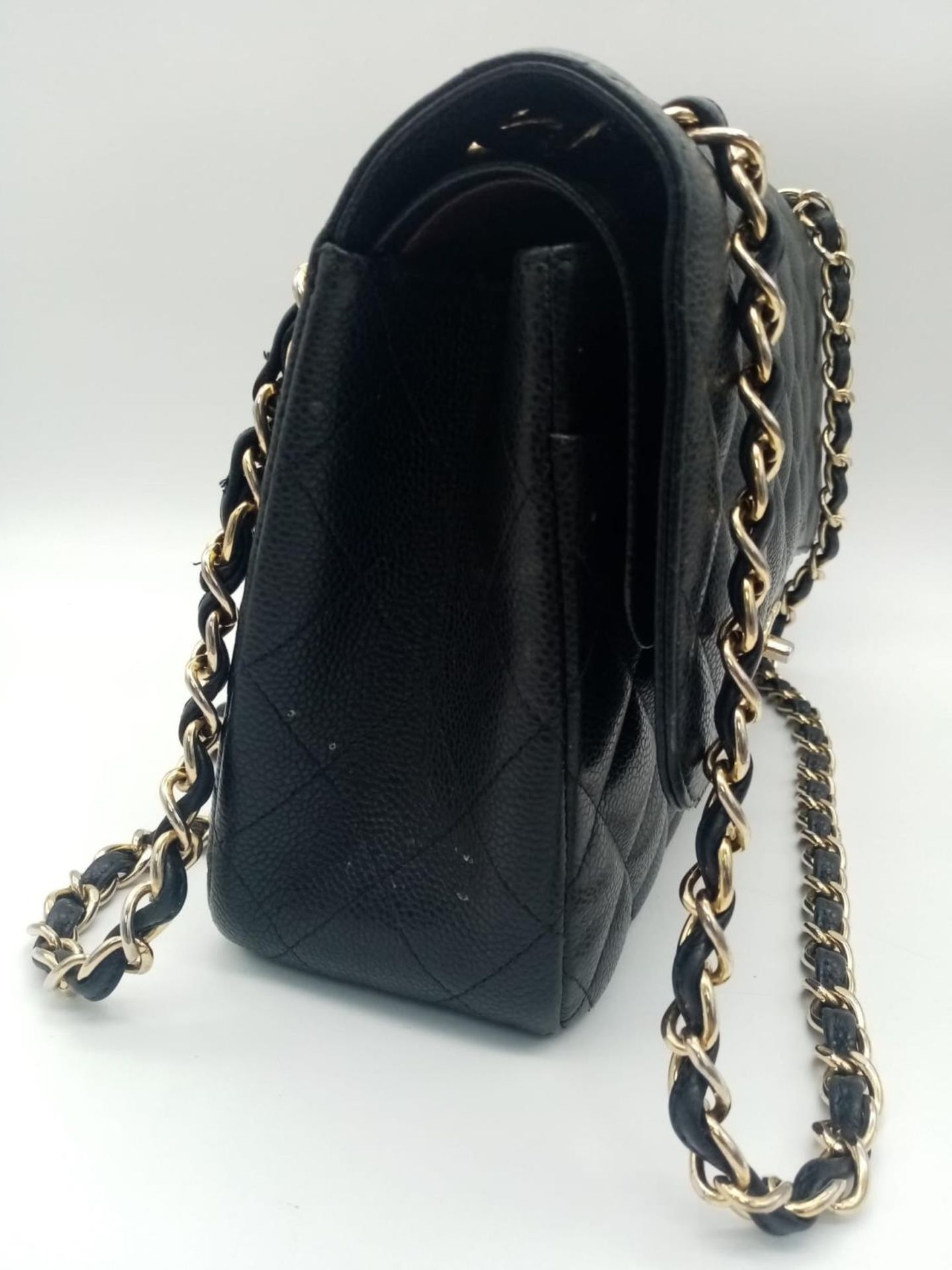 A Chanel Black Caviar Classic Double Flap Bag. Quilted pebbled leather exterior with gold-toned - Image 3 of 11