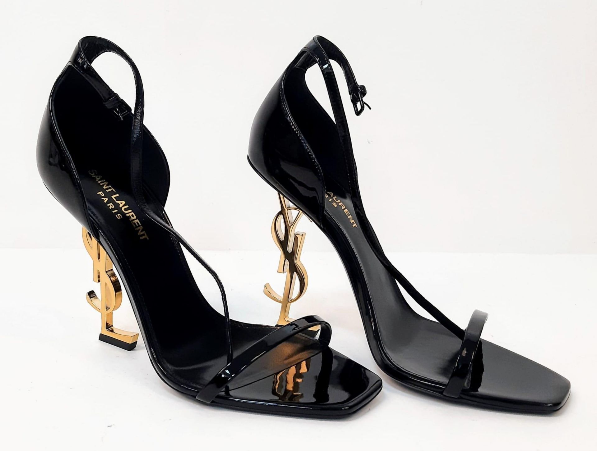A PAIR OF NEW AND UNWORN YVES SAINT LAUREN "OPYUM" YSL HEEL COCKTAIL SHOES IN SIZE 6 UK . 39