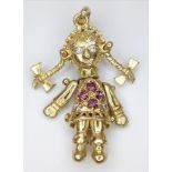 A 9K GOLD ARTICULATED RAG DOLL CHARM . 2.9gms