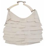 A YSL Saint-Tropez Leather Double Horn Hobo Bag. Ivory leather strip exterior. Horn shaped