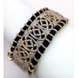 A Diamond Tennis Bracelet with 10ctw (approx) of round cut diamonds set in 925 Silver on a black