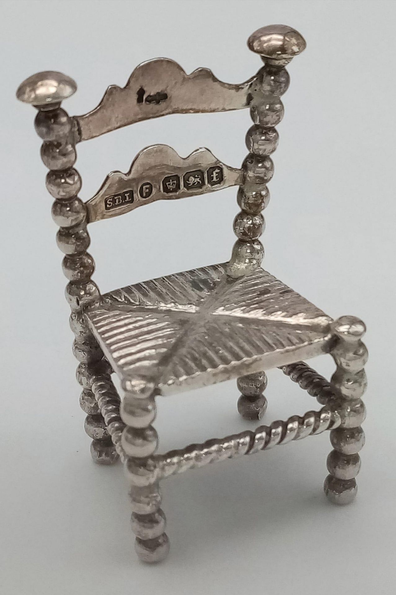 A Rare Imported Sterling Silver Miniature Chair Figure - 4cm tall. The chair has hallmarks for
