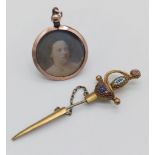 Two Antique Yellow Metal Pendants - Enamel sword (7cm) and photo - 3cm.