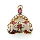 A 9K YELLOW GOLD VINTAGE PEARL & RED STONE FANCY PENDANT. 2.5cm length, 1.8g total weight. Ref: