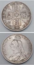 An 1887 Queen Victoria Silver Double Florin Coin. VF/EF grade.