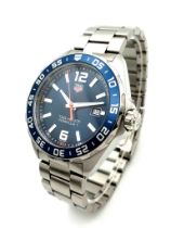 A Tag Heuer Formula 1 Gents Watch. Stainless steel bracelet and case - 43mm. Blue dial with date