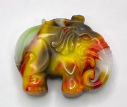 A Multi-Coloured Carved Jade Elephant Pendant. 5cm x 4cm.