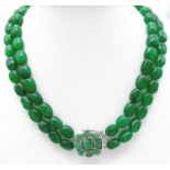 A Two Strand Emerald Oval Beaded Necklace. With a matching gemstone and Silver Clasp. Beads-