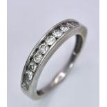 A 14K White Gold, Diamond Half-Eternity Ring. Size N. 2.55g total weight. Ref: 10437