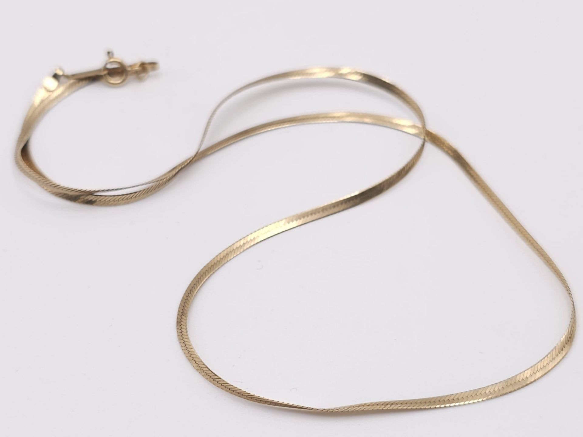 A wonderful, 9 K yellow gold, flat chain necklace and bracelet set. Necklace length: 41 cm, bracelet - Bild 2 aus 8