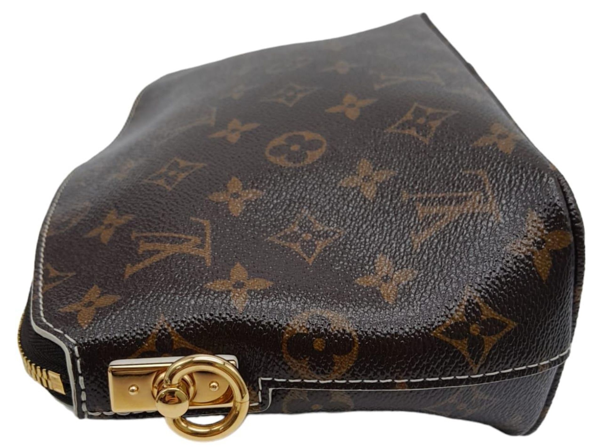 A Louis Vuitton Lockit Fetish Clutch Bag. Monogram canvas with gold tone hardware. Lock and keys. - Image 4 of 7