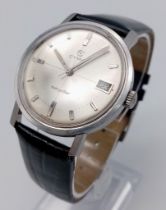 A Vintage CYMA Navystar Gents Watch. Black leather strap. Stainless steel case - 35mm. Silver tone