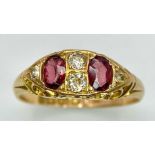 A vintage, 18 K yellow gold ring with two oval cut garnets beautifully set between diamonds. Ring
