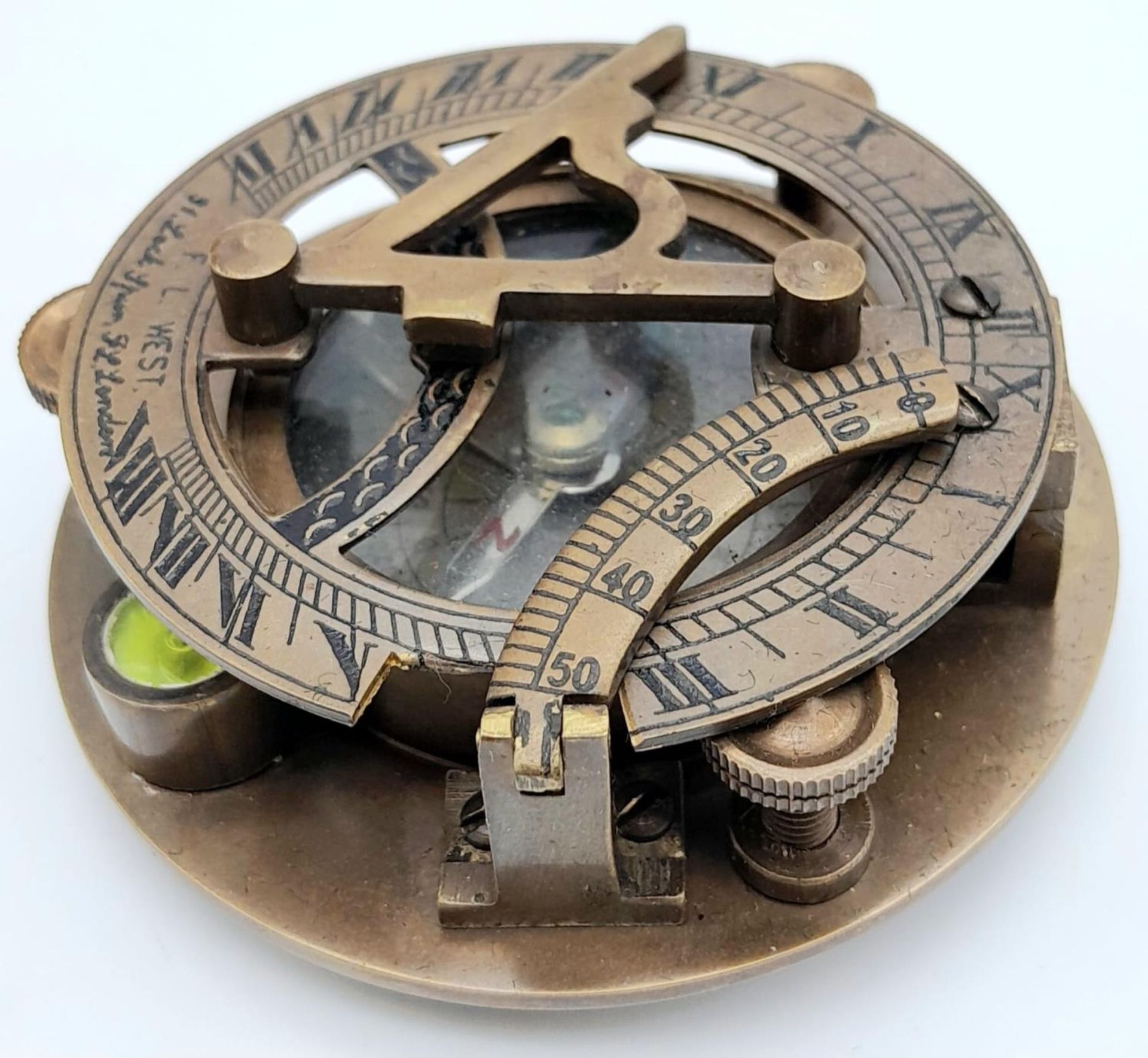 A Portable Folding Bronze Sundial/Compass in its own Wooden Presentation Case. 7.5cm. In good