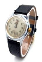 A Vintage Zenith Ladies Watch. Brown leather strap. Stainless steel case - 28mm. Silver tone dial
