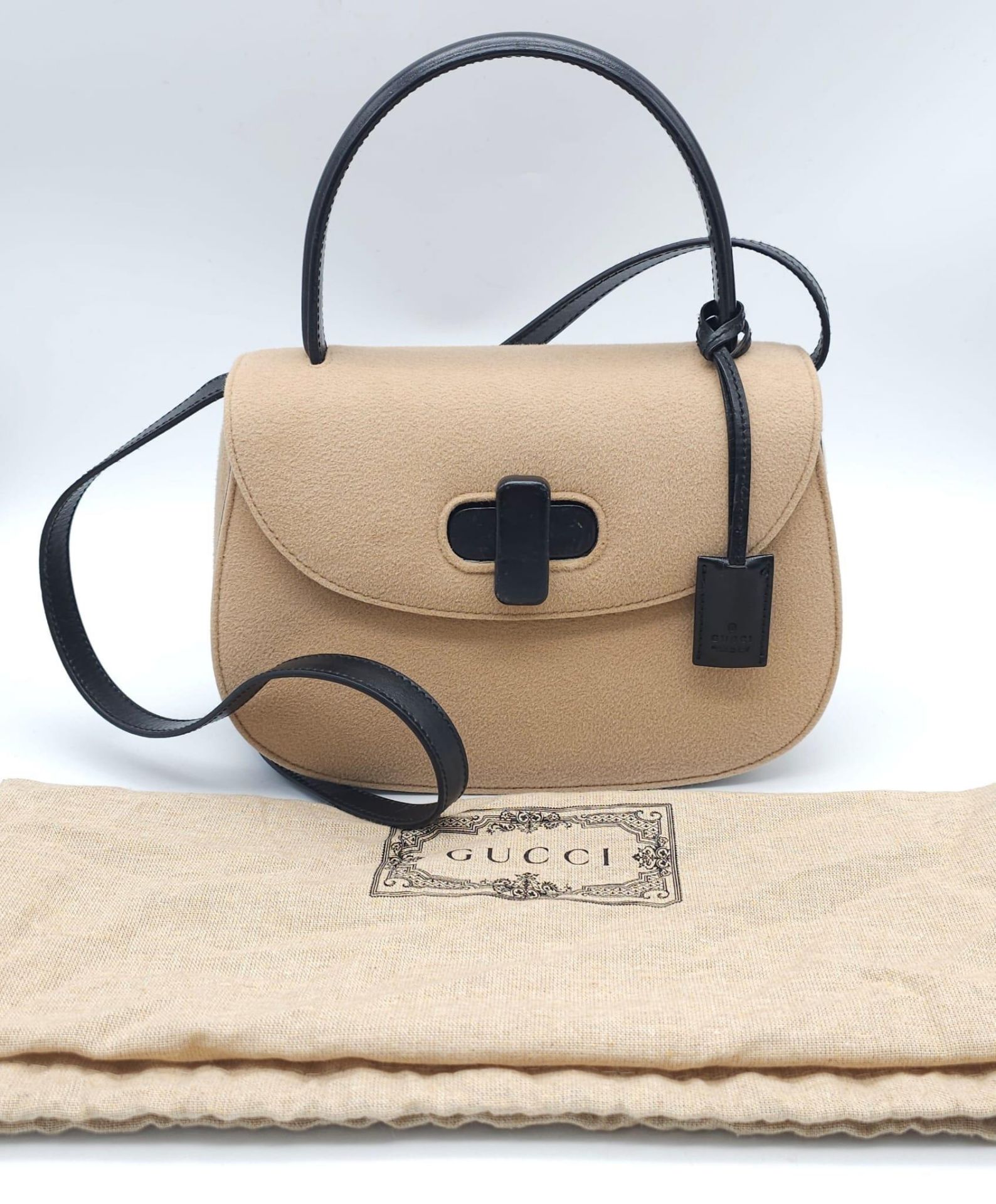 Gucci Tan Wool Purse. This Gucci tan wool purse features a black bar closure, black leather - Image 2 of 15