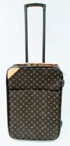 A Louis Vuitton Monogram Canvas Pegase Rolling Suitcase. 37 x 55 x 20cm. Leather accents. Large