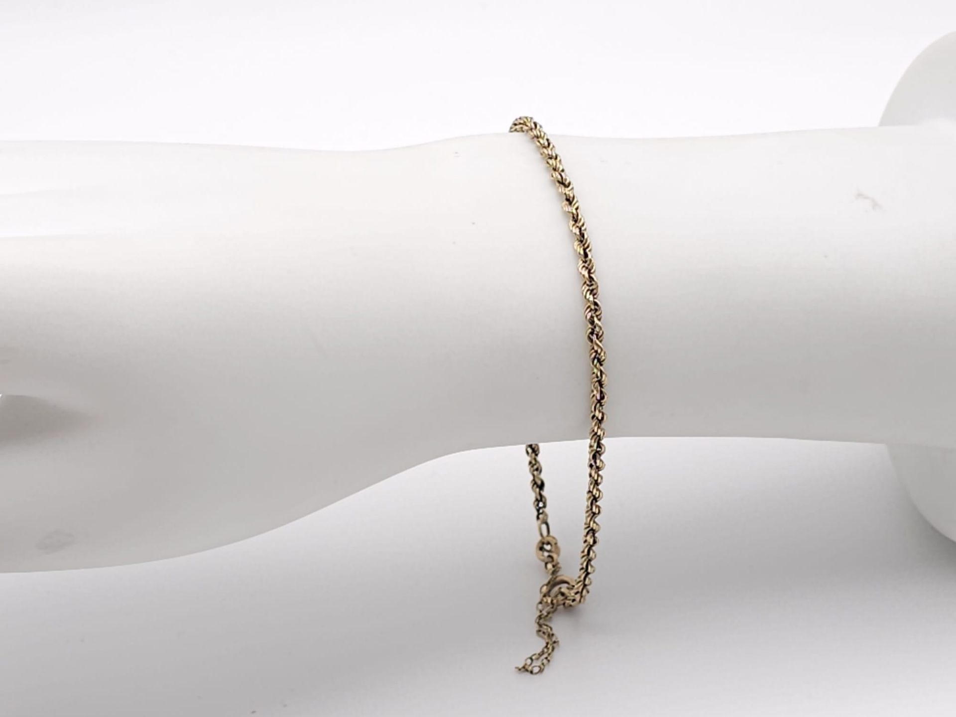 A 9 K yellow gold rope chain necklace and bracelet set. Necklace length: 59 cm, bracelet length: - Bild 9 aus 9