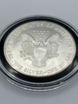 United States PURE SILVER DOLLAR. 1994 SILVER EAGLE/WALKING LADY . Complete with certificate of