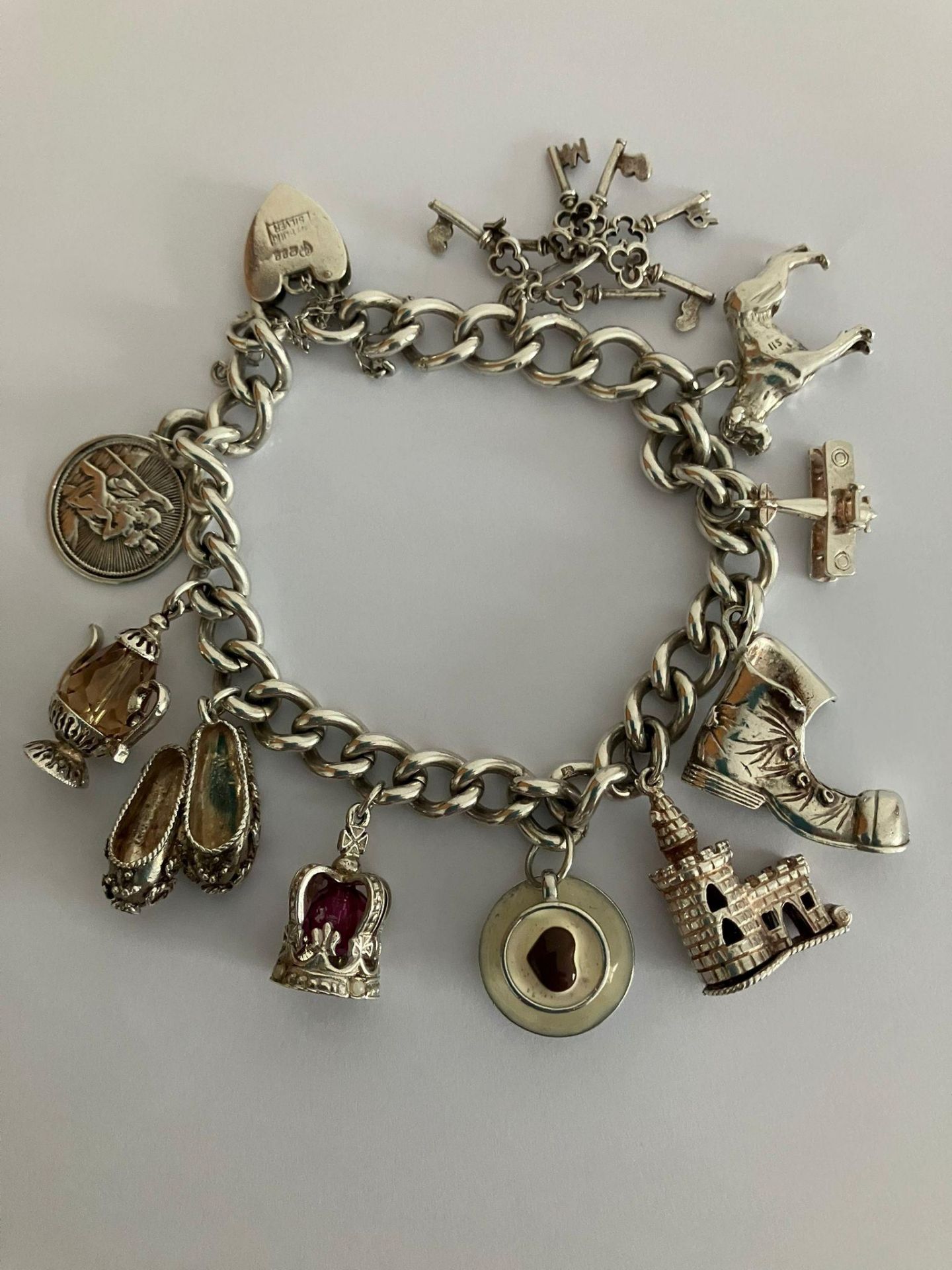 Vintage SILVER CHARM BRACELET, Silver Charms to include RAF biplane, Castle with turret, Saint - Bild 2 aus 2