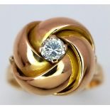 AN 18K YELLOW GOLD TWIST DIAMOND SOLITAIRE RING - 0.15CT. 4.3G. SIZE O.