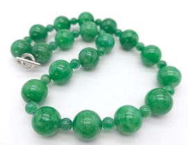 An exquisite large Jade Beaded Necklace. A mixture of big and small brightly coloured Jade rounded