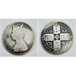 An 1879 Queen Victoria Florin Silver Coin. Please see photos for conditions.