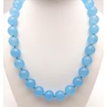 A Large Blue Jade Beaded Necklace. Ice blue 14mm beads. 42cm length.
