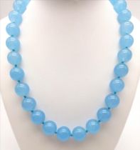 A Large Blue Jade Beaded Necklace. Ice blue 14mm beads. 42cm length.