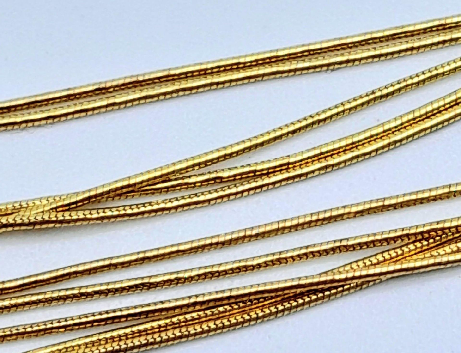 A very feminine, 9 K yellow gold, four chain necklace. length: 43 cm, weight: 9 g. - Bild 3 aus 6