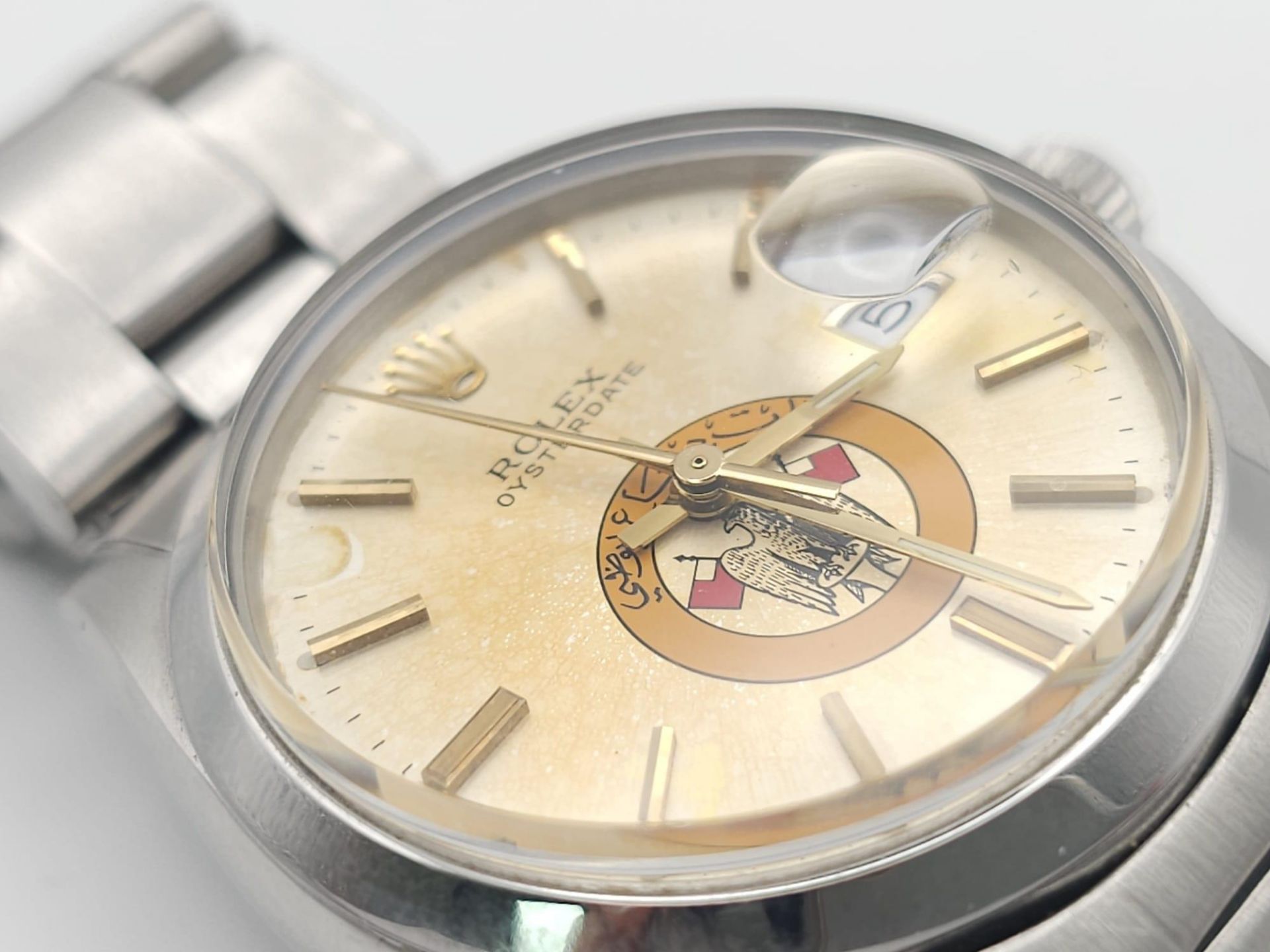 A ROLEX OYSTERDATE IN STAINLESS STEEL SPORTING THE EAGLE LOGO OF ABU DHABI .(DIAL NEEDS CLEANING) - Image 6 of 13