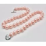A Metallic Pink South Sea Pearl Shell Bead Necklace. 12mm beads. 55cm necklace length.