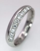 A 950 Platinum Diamond Half Eternity Ring. Size M/N. 6.5g total weight. Ref: 15813