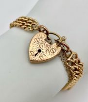 A Beautiful Vintage 9K Gold Two Row Curb Link Bracelet with Heart Clasp. 18cm length. 26.75g weight.