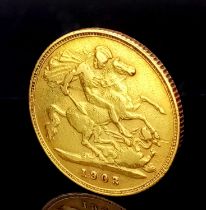 A 1903 HALF SOVEREIGN MADE IN 22K GOLD AND WEIGHING 4gms