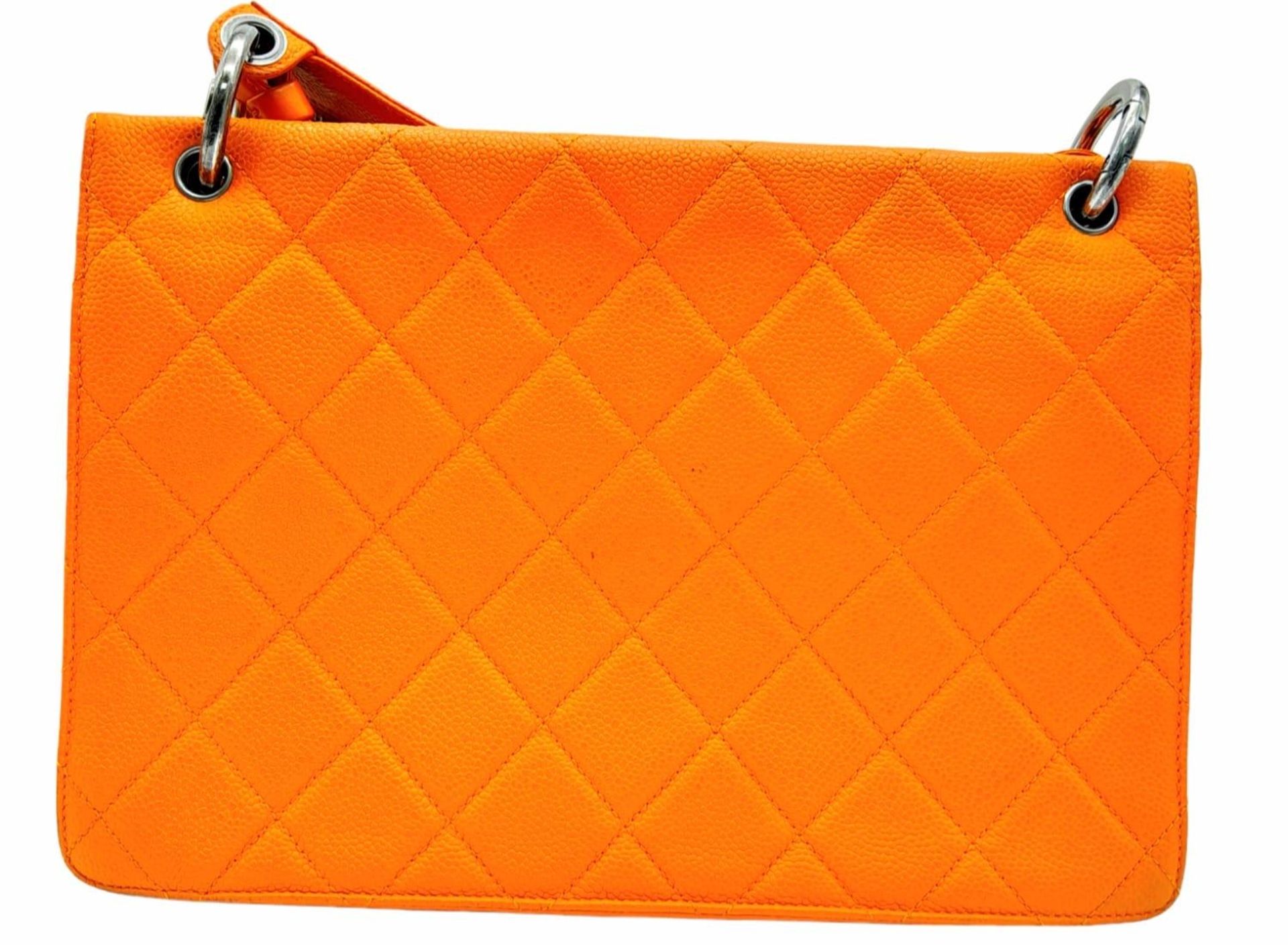 A Chanel Quilted Orange Caviar Leather Shoulder Bag. Quilted pattern exterior with gunmetal - Image 7 of 13