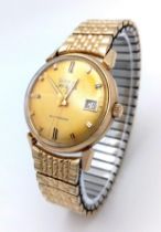 A Vintage 1960s Bulova Self-Winding Gents Watch. Gold plated expandable strap. Gold plated case -