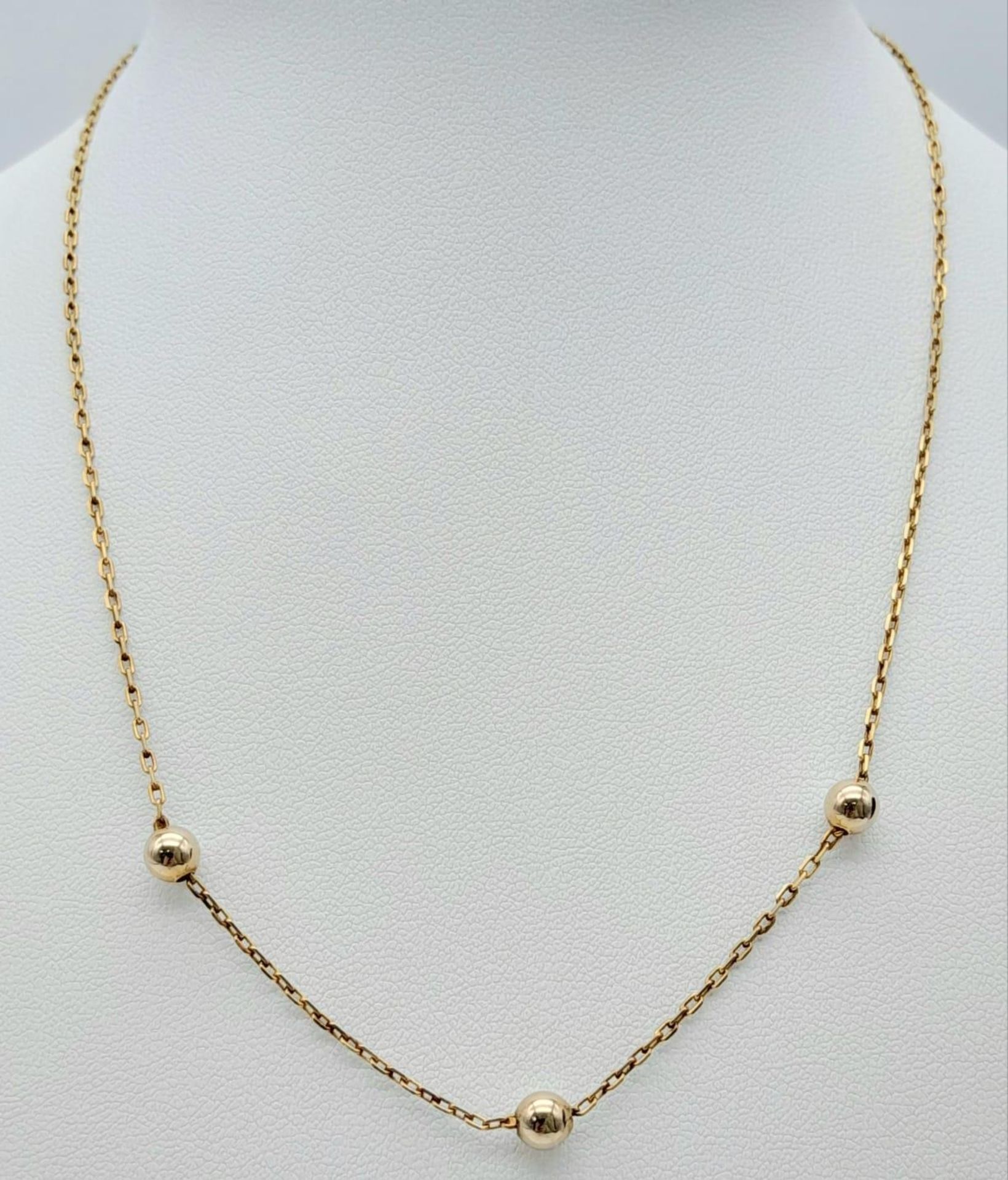 A very attractive, 9 K yellow gold chain necklace with golden balls and a pair of matching earrings. - Bild 2 aus 6