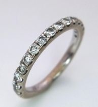 An 18K White Gold and Diamond Half Eternity Ring. Size K/L. 2.85g total weight. Ref: 15620