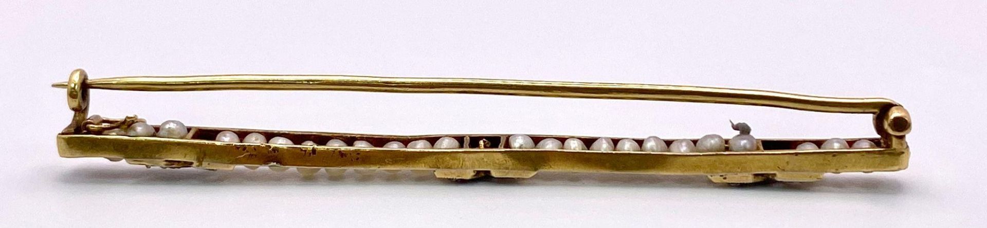 An Antique Mid-Karat Gold, Pearl and Diamond Bar Brooch. 6.5cm length. 5.24g total weight. - Image 4 of 4