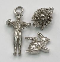 Sterling silver selection of 3 charms including rabbit, hedgehog and man, 6.3g total weight.