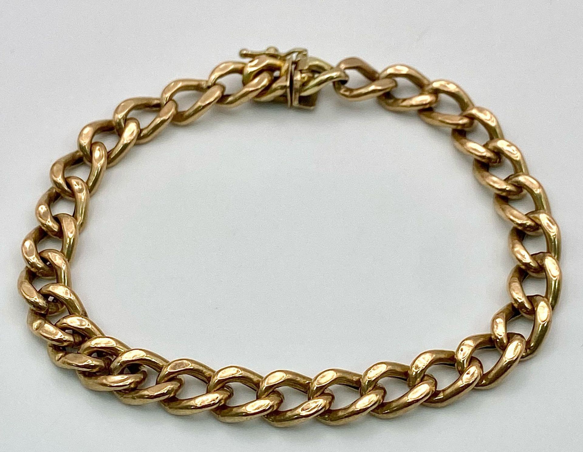 A 9k yellow gold curb bracelet - 23cm length. 11.3g - Bild 4 aus 7