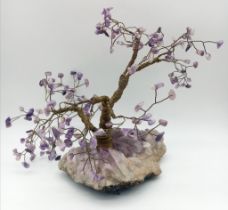 AN AMETHYST TREE OF LIFE 24cms IN HEIGHT