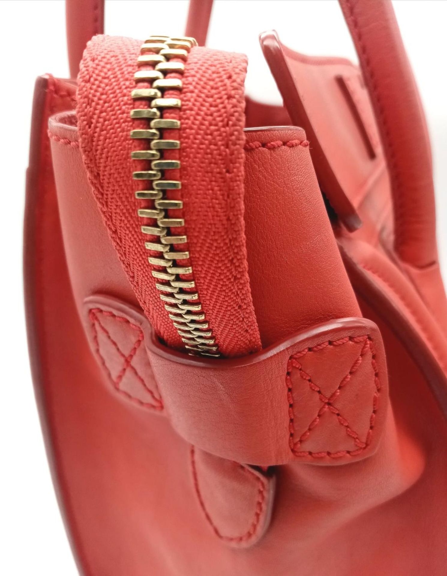 A Celine Coral Luggage Bag. Leather exterior with two rolled leather handles, a zipped pocket to the - Image 6 of 12