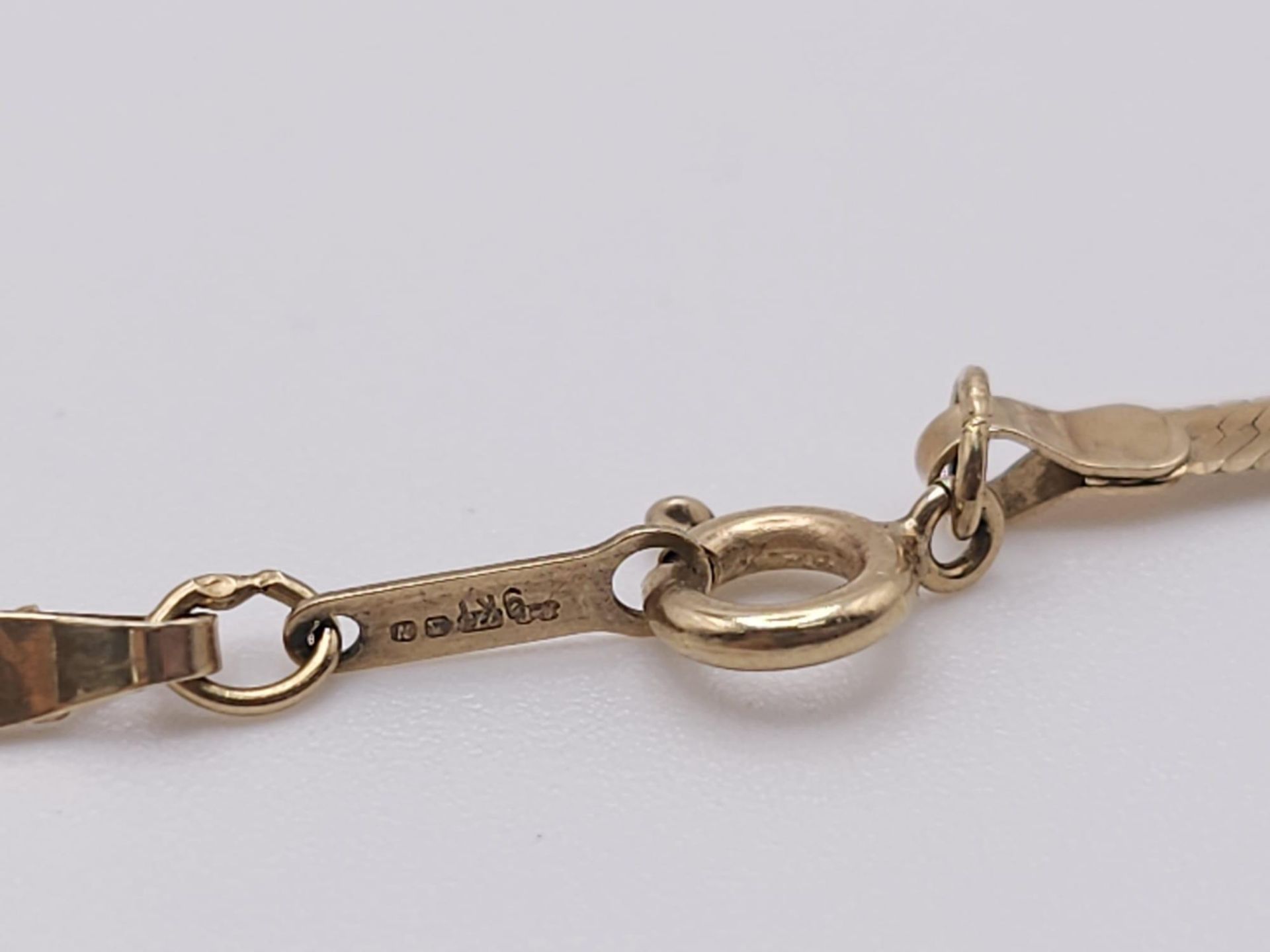 A wonderful, 9 K yellow gold, flat chain necklace and bracelet set. Necklace length: 41 cm, bracelet - Bild 4 aus 8