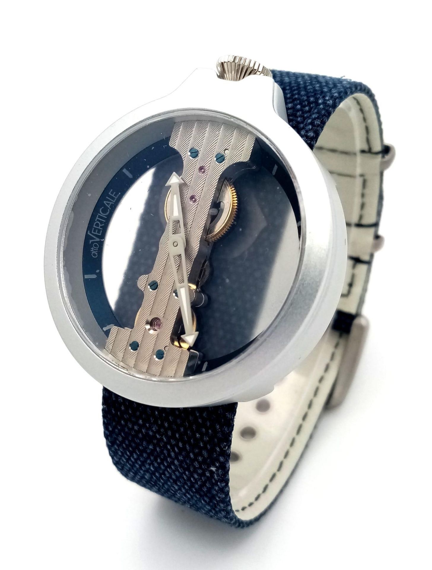 A Verticale Mechanical Top Winder Gents Watch. Blue Denim strap. Ceramic skeleton case - 42mm. As