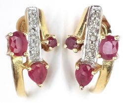 A Pair of 18K Yellow Gold, Ruby and Diamond Crescent Earrings. 3.15g total weight.