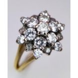 AN 18K YELLOW GOLD DIAMOND CLUSTER RING - 1CT. 3.7G. SIZE H