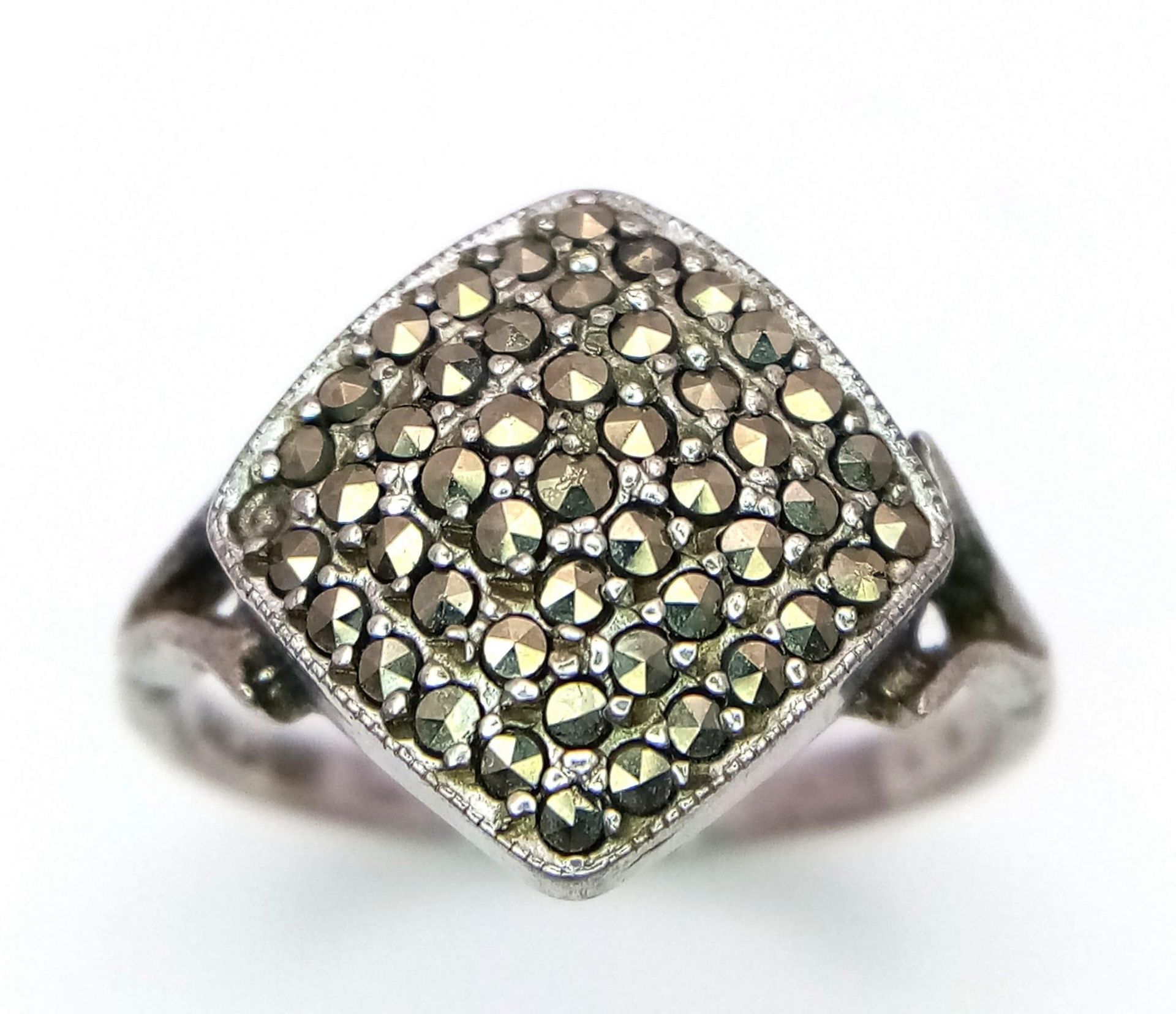 A vintage silver stone set cluster ring. Total weight 2.8G. Size L.