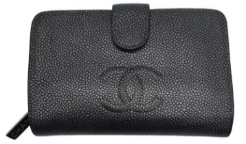 A Chanel Metallic Grey Leather Purse/Wallet. Textured leather exterior with embossed CC logo.